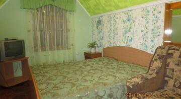 Фото номера Стандартный четырехместный номер Гостиница Guest House Natali г. Курортное 4