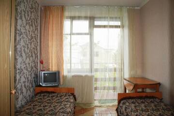 Фото номера Двухместный номер с 2 отдельными кроватями и душем Гостиница Гостевой дом Демид г. Курортное 4