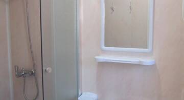 Фото номера Cемейный номер с отдельной ванной комнатой Гостиница Гостевой Дом Парус г. Курортное 2